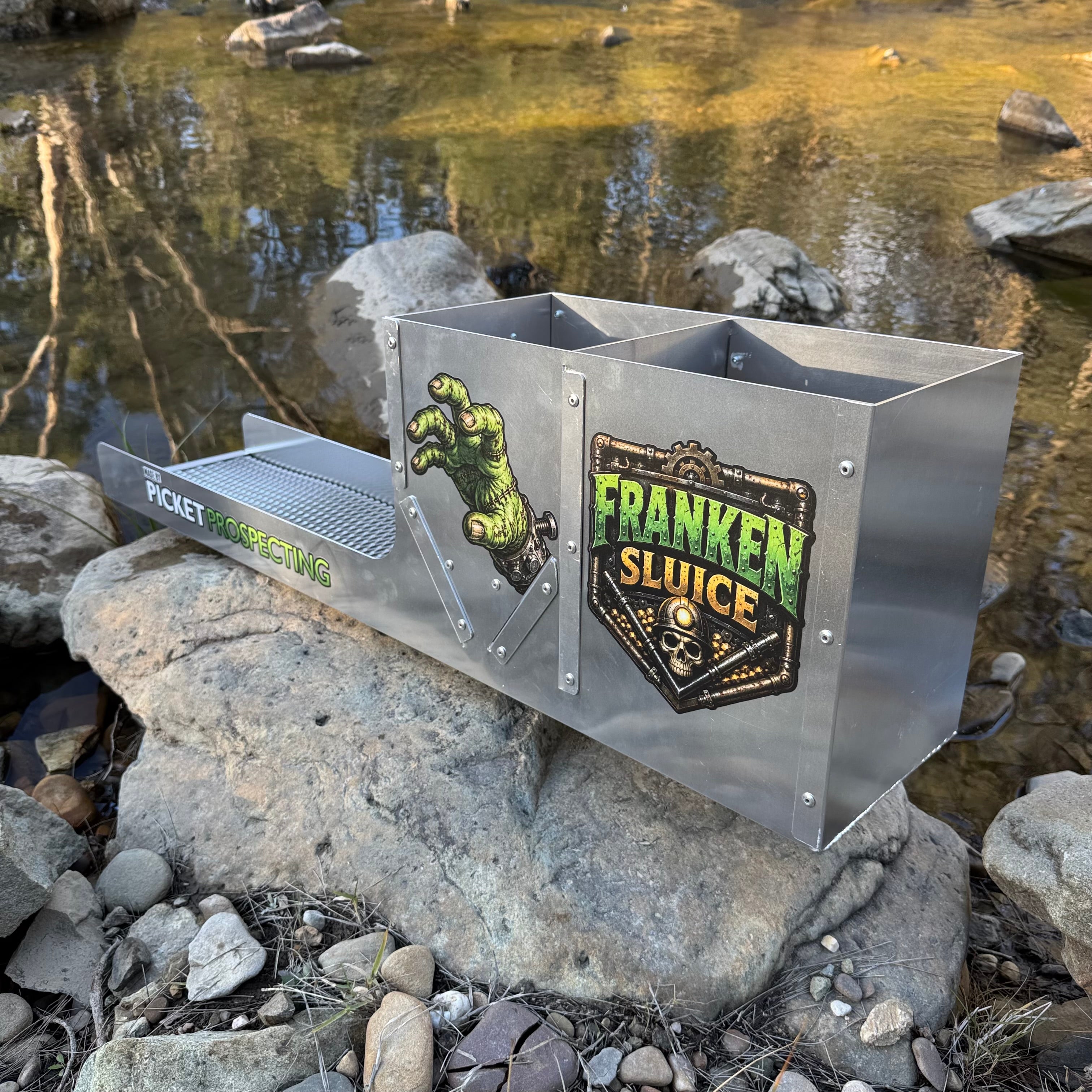 Displaying the back side of an aluminium Franken Sluice, aluminium mesh in a creek setting.