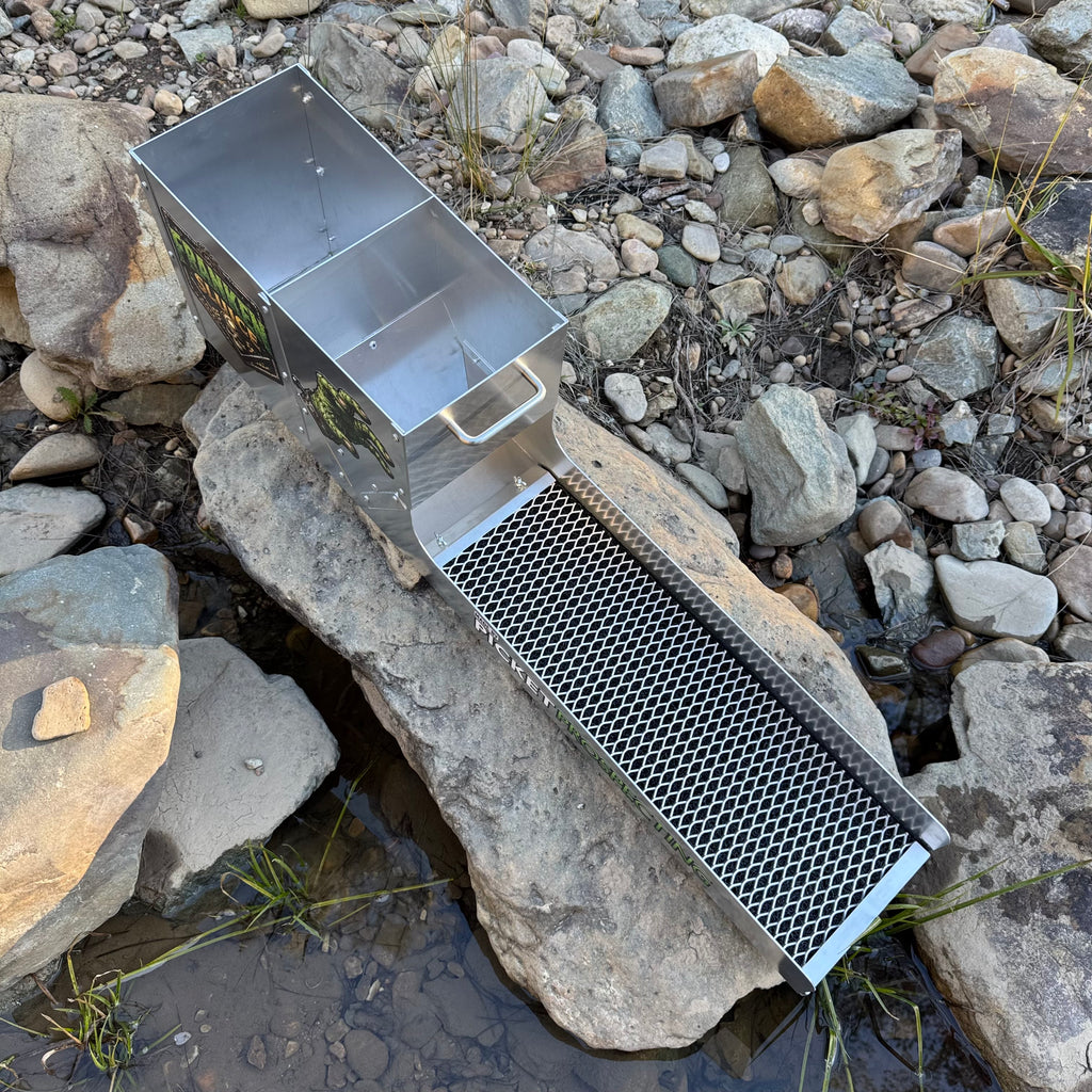 Displaying the top side of an aluminium Franken Sluice, aluminium mesh in a creek setting.